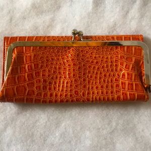 Alligator like orange clutch wallet